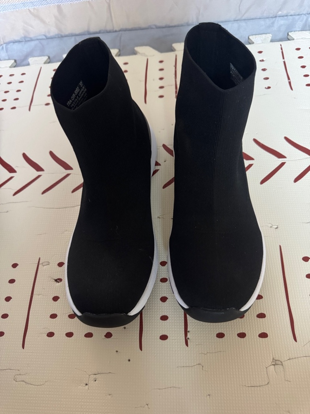 Alegria Black Knit Sock-Style Slip-On Sneakers with White Trim